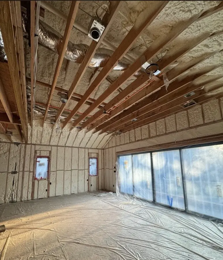 Interior walls and ceiling insulated with spray foam during new construction in Danvers